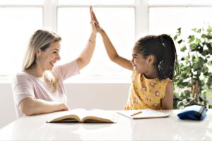 Resources 22 mother help girl doing homework at home Resources