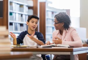 student talking to tutor College Tutors