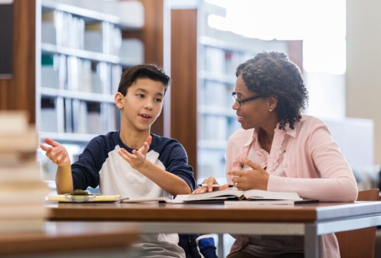 Resources 2 student talking to tutor College Tutors