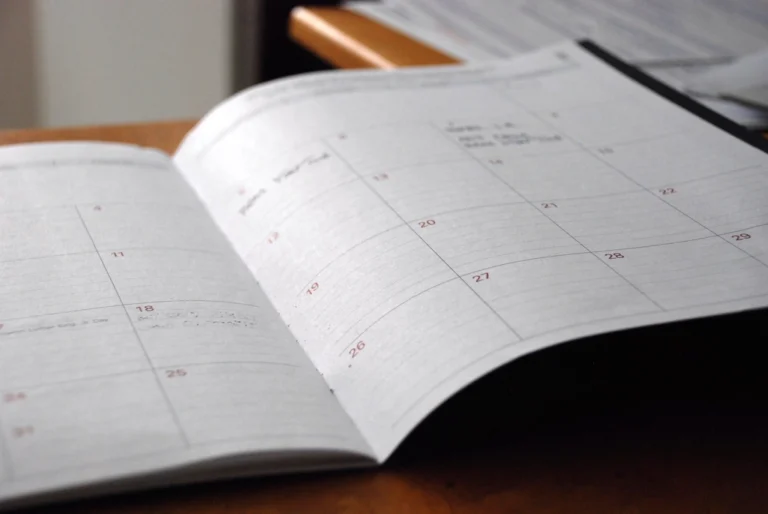 An open monthly planner used to map out a fall test retake schedule